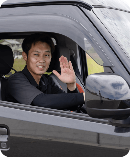 OKサインをしている宅配男性